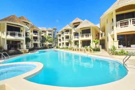 Ambassador in Paradise Отели рядом с достопримечательностью «Пятница Бич»