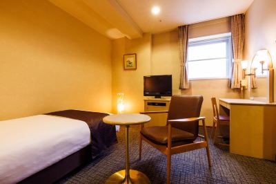 洋室シングル（バス付）（禁煙） 亀の井ホテル 潮来の写真