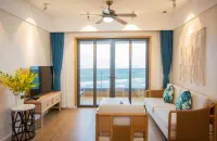 Wanning Riyuewan lives in Summer Seaview Surfing Apartment