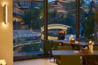 Qianli Zou Danqi Ganlushan Homestay (Wuhan Ganlushan Wenchuangcheng) - con terme