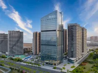 Elong Hotel (Qingdao Oriental Movie Metropolis فنادق في تشينغ داو