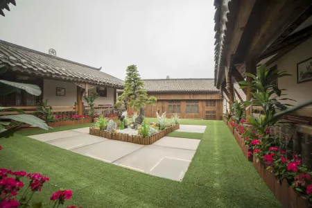 Weixin Zhaxi Chinese Inn Отели в г. Вейсинь