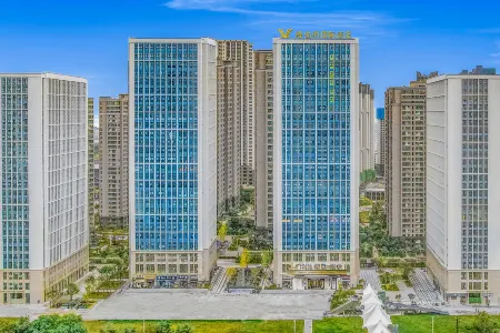 Vienna International Hotel (Kunming Xinluoshiwan South Bus and Subway Station) Отели рядом с достопримечательностью «Kunming Railway Vocational and Technical College (Yangfu Campus)»