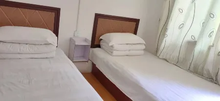 Nayi Huiyuan Hostel Отели рядом с достопримечательностью «Jiutian Cave Zongxi River Scenic Tourist Area»