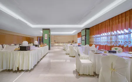 Vienna International Hotel (Ningming Huashan) Отели в г. Нинмин