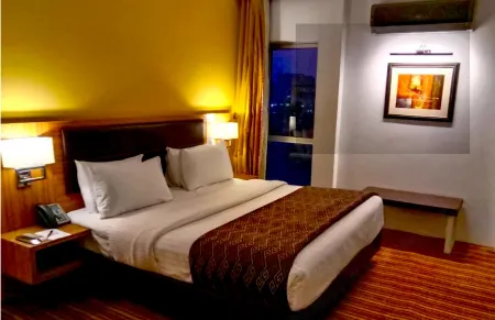 West Inn Hotel Faisalabad Отели рядом с достопримечательностью «The Chenab Club»