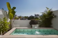 Manyu·Slow Life Net Red Designer Homestay (Sanya West Island Branch) - น้ำพุร้อน