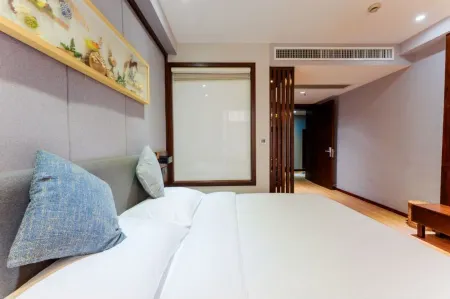 Huamei Shilan She Отели рядом с достопримечательностью «Shanghai Industry and Commerce Foreign Language College South Campus»