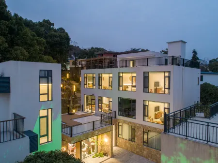 Floral Lux Hotel·Galaxy Valley Hotel Отели рядом с достопримечательностью «Haihuizhen»