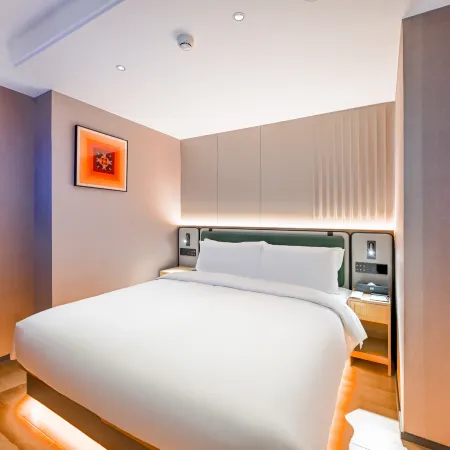 Qiuguo Hotel (International Trade Center Branch) Отели рядом с достопримечательностью «Интернешнл Трайдерс Билдинг»