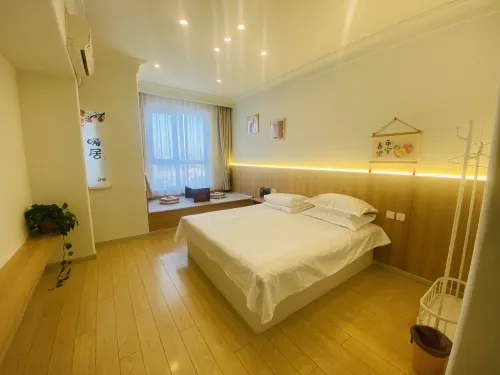 Happy Hour Seaview Apartment (Bayuquan Hongji Branch)