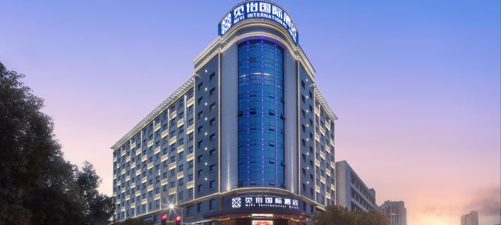 Miyi International Hotel (Huanggang Normal University Yi'aihu Branch) Отели в г. Хуанган
