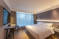 โรงแรม Ni Hao (สถานีขนส่ง ฉี่ตง) - ที่มีที่จอดรถ