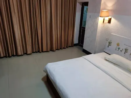 Fusui Wulong Hotel Отели рядом с достопримечательностью «Guangxi Foreign Languages College (Airport Campus)»