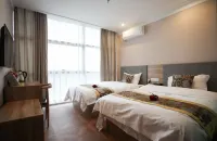 Donghui Business Hotel (Feixi Taohua Town Government Baida Outlet Living Plaza)