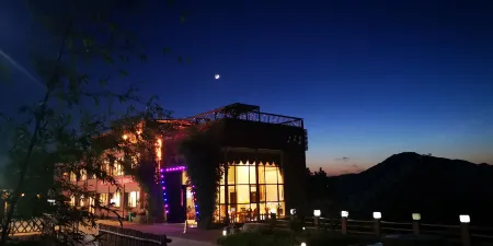 Guanshan Shiwai Chayuan Inn Отели в г. Баокан