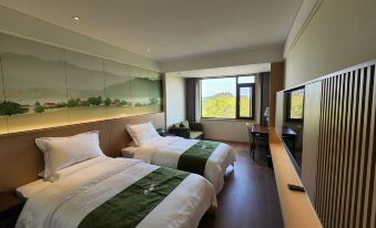 Xinyang Wenxin Chacun Resort Hotel