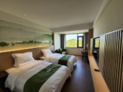 信陽文新茶村度假酒店 信陽酒店