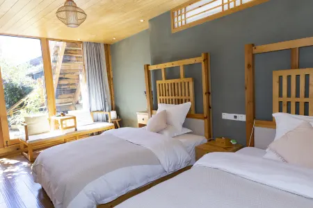 Zen Holiday Inn (Lijiang Ancient City Sifang Street) Отели рядом с достопримечательностью «Ancient City Huangshan Mountain Park Wenchang Palace»