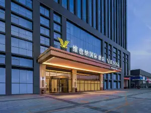 Vienna International Hotel(Zhoukou Wanguo Car World Store)