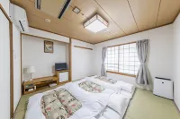 晴岩飯店 Senri Kinran University附近的飯店