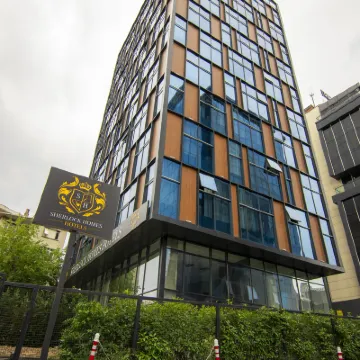 Sherlock Homes Hotels Hotel in zona Lato Asiatico