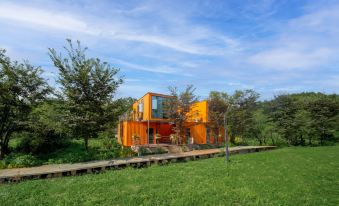 Tengyun Xiandailüyougenjudi Homestay (Zhalaiwanzhan Station)