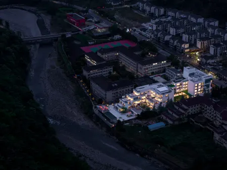 Xingye Snow Mountain Manor Отели рядом с достопримечательностью «Xiling Snow Mountain»