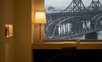 Tian Yu An Art Hotel(Dan Dong Train Station Ya Lu River Bridge) )