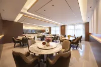 Xingyue Hotel (Dashang New Mart Jiamusi Station) - petit déjeuner