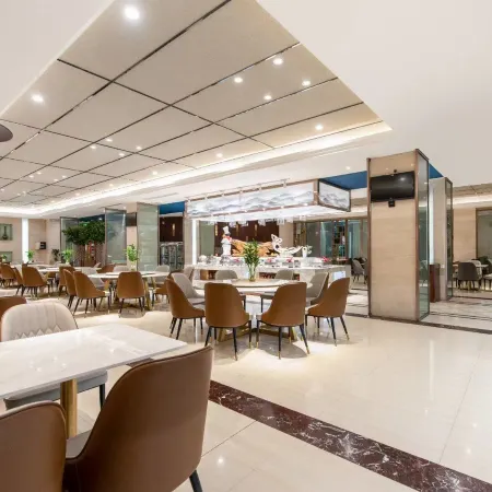 Xingang Holiday Hotel(Xinzheng International Airport Shop) Отели рядом с достопримечательностью «Отель Cai Jianguo - Конференц-зал»