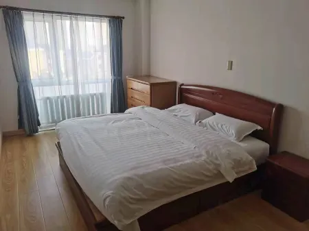 Acacia Villa Отели рядом с достопримечательностью «Dalian Minzu University»