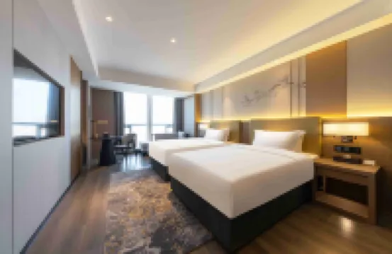 The GiorgioMorandi Hotels (Zaozhuang West Station Xuecheng Wanda Plaza) - ที่มีที่จอดรถ