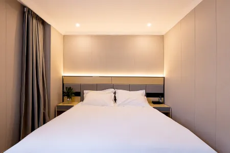 Yizhou Hotel Отели рядом с достопримечательностью «Minhang Gymnasium»