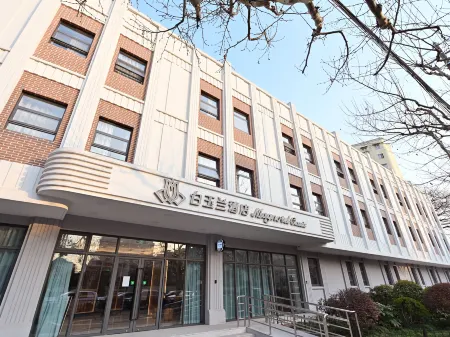 Magnotel Отели рядом с достопримечательностью «Shanghai University of Engineering Science (Xincun Road)»