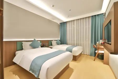 Yuehao Holiday Hotel (Dunhua High-speed Railway Station) Отели рядом со станцией Dunhua Railway Station