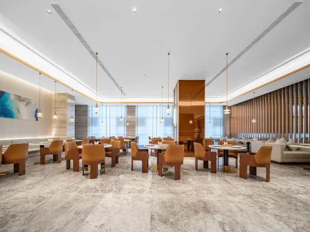 Madison Hotel Wuxi Luocheng Отели рядом с достопримечательностью «Wuxi College of Vocational Technology (Qian'ou Road)»