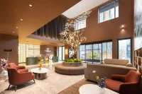 Yun Nan She Holiday Hotel (Qiqiqiao Shiqiao Market Branch, Jinzhou Railway Station)
