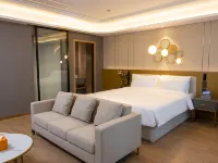 Orange Hotel (Changxing Pearl Store) Hotel in zona Qishan Botanical Garden
