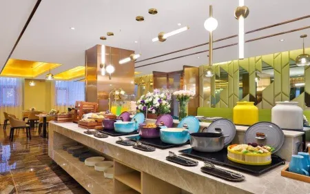 Crystal Orange Xu Zhou Su Ning Guang Chang  Hotel Отели рядом с достопримечательностью «China University of Mining & Technology-Beijing(Wenchang Campus)»