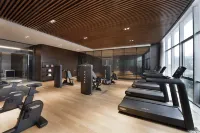 Grand Barony Qingdao Airport Hotel - С тренажерным залом