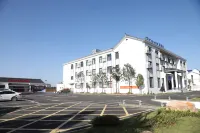 Huianda Traveler-Inn Hotel (Yichun Zhangshu East Station) Hotel di Zhangshu
