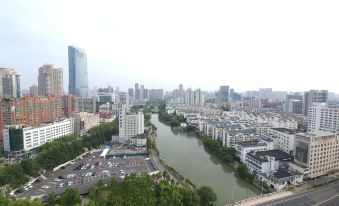 Erjia Apartment (Wuxi Greenland Guanlanwan Shop)
