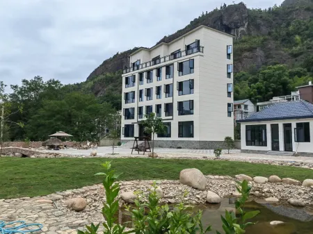 Xifeng Yayuan Homestay Отели рядом с достопримечательностью «Yongjia Academy»