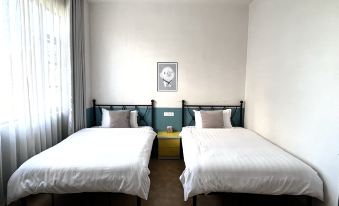 Chengjiang Qieman Holiday B&B