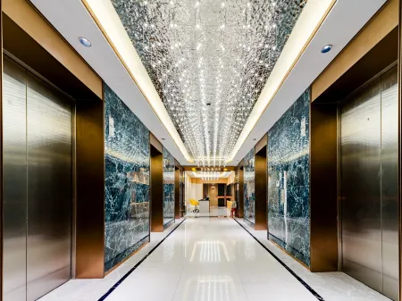 Yuecheng Lizhi Hotel (Tai'an Wanda Plaza Convention Center) Отели рядом с достопримечательностью «Mining Engineering Academy Resources and Environmental Engineering College»