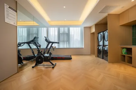 Kunlun Leju Hotel (Xinzheng Xuanyuan Lake) Отели рядом с достопримечательностью «Huang Di's Hometown»