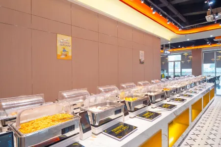 Manshiguang Premium Executive Apartment (Dongguan Sports School Xinghua Smart City Branch) Отели рядом с достопримечательностью «Guangdong University of Science & Technology»