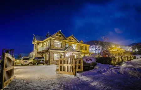 Qu She Boutique Hotel Отели рядом со станцией Yabuli South Railway Station