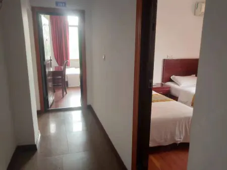 Xinyuelai Business Hotel Отели рядом с достопримечательностью «Shuangshandao Wetland Park»